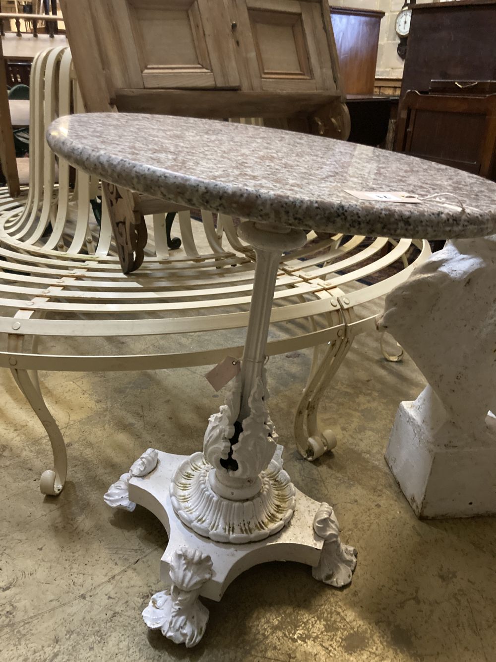 A Victorian cast iron circular marble topped garden table, diameter 60cm height 76cm